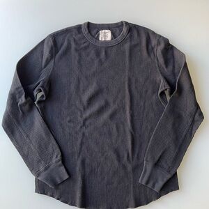 Two (2) Buckmason Vintage Thermal Surplus Tee in black.